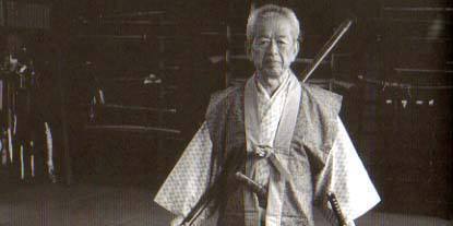 Hatsumi Sensei with naginata (glaive) and toh (sword).